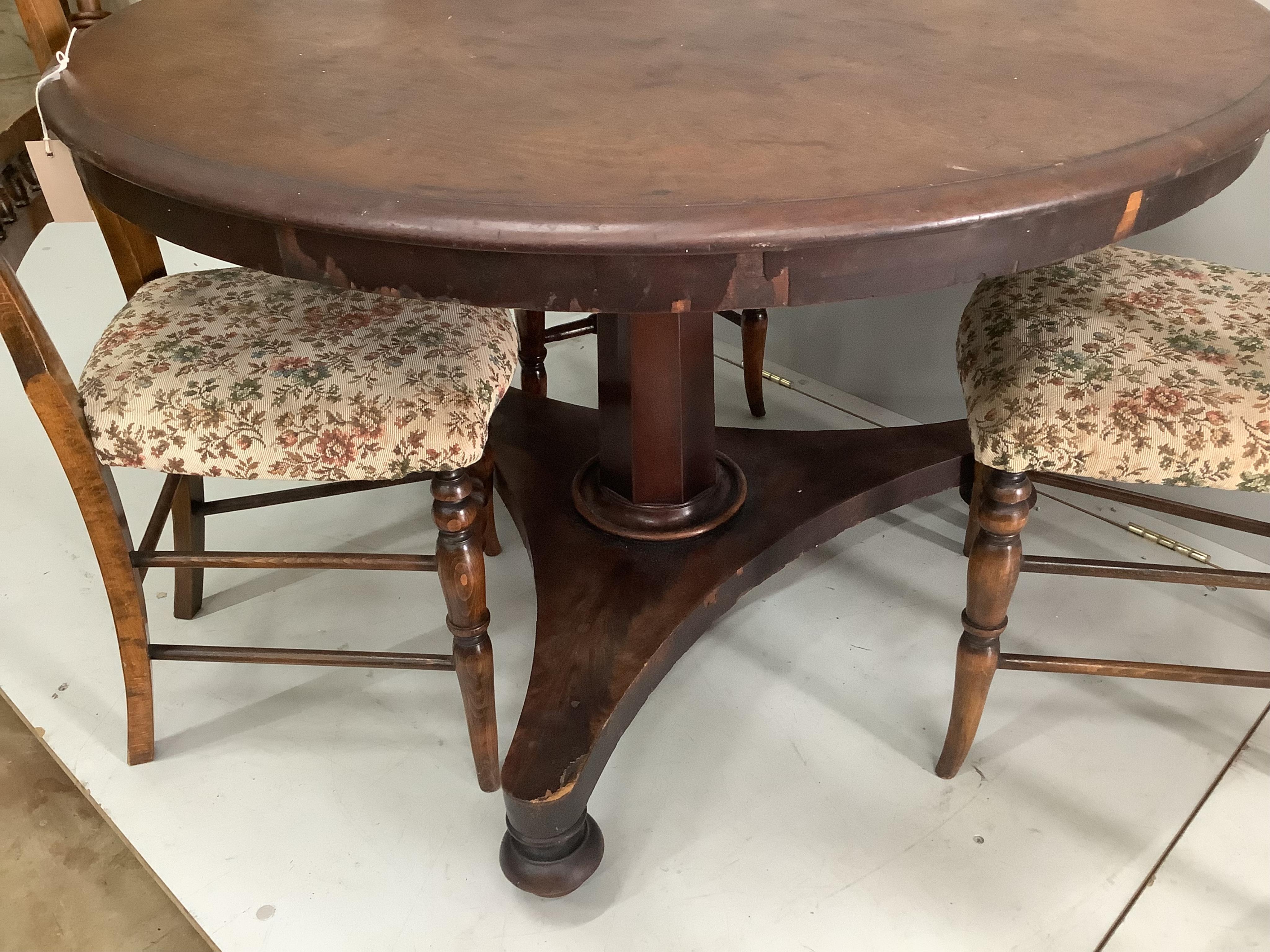 A Victorian mahogany circular tilt top breakfast table, diameter 104cm, height 71cm, together with four Victorian beech dining chairs. Condition - fair